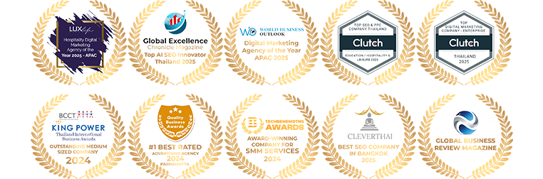 Golden award badges showcasing web agency's expertise in SEO, web development, and digital marketing, 2022-2026.